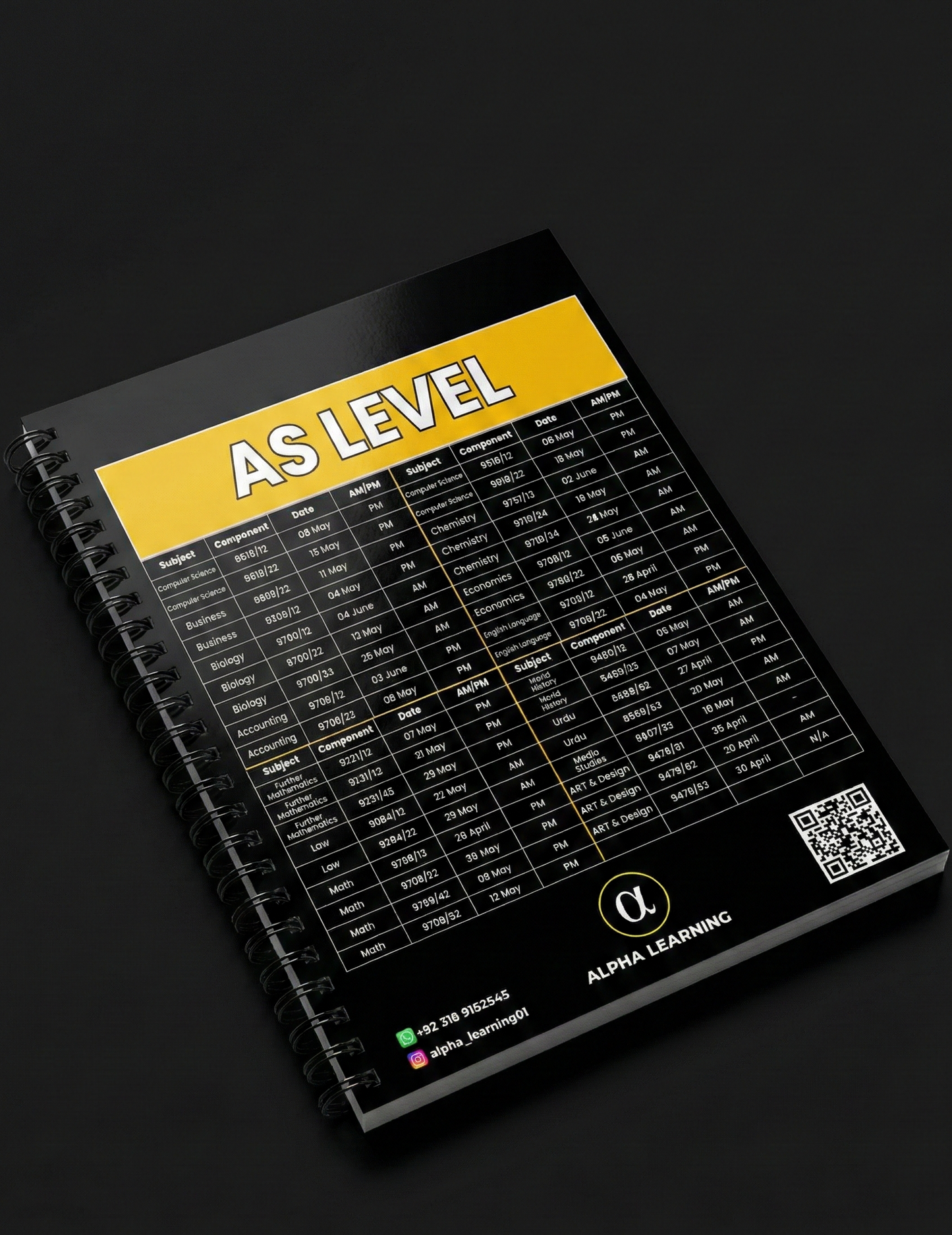 Notebook with 'AS Level' text on a dark background